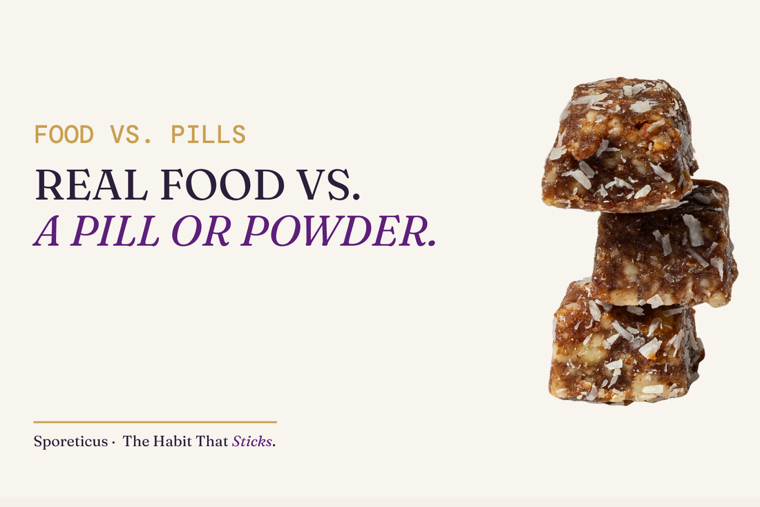 Sporeticus blog hero: FOOD VS. PILLS. Real food vs. a pill or powder. With a stack of Sporeticus Energy Bites.